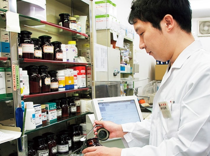 写真:管理薬剤師 樽本 昌典